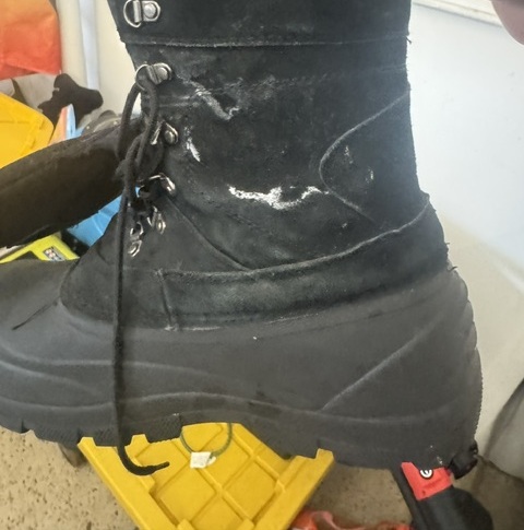 Boot with a visible white salt residue line